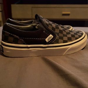 Black and grey checkered slip on kids vans